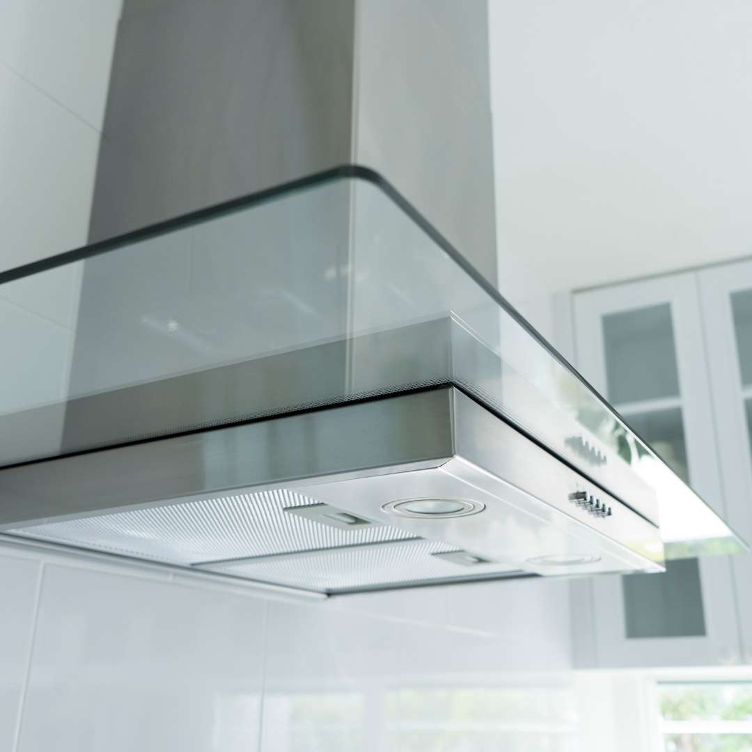 Clean a glass kitchen hood